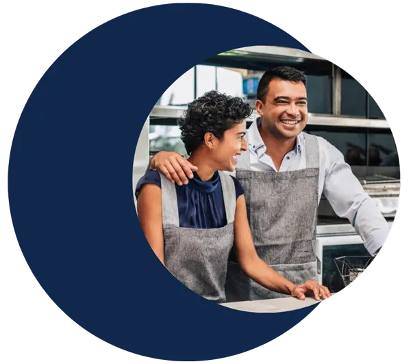 Business partners shaking hands, symbolizing a successful financing deal.