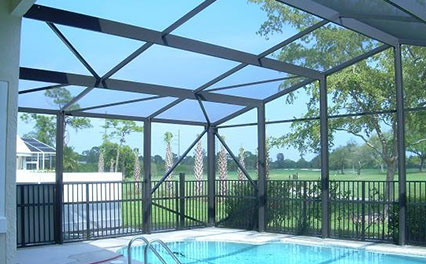 Florida home with a palm-lined backyard swimming pool