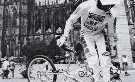 BMX rider riding the ramp during a school assembly performance